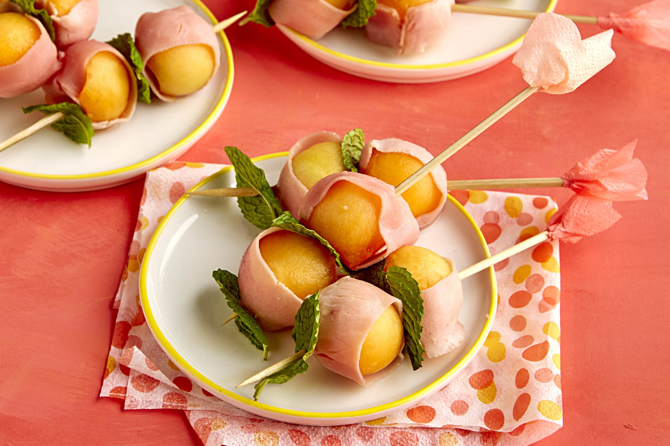 A bowl of fruit on a plate