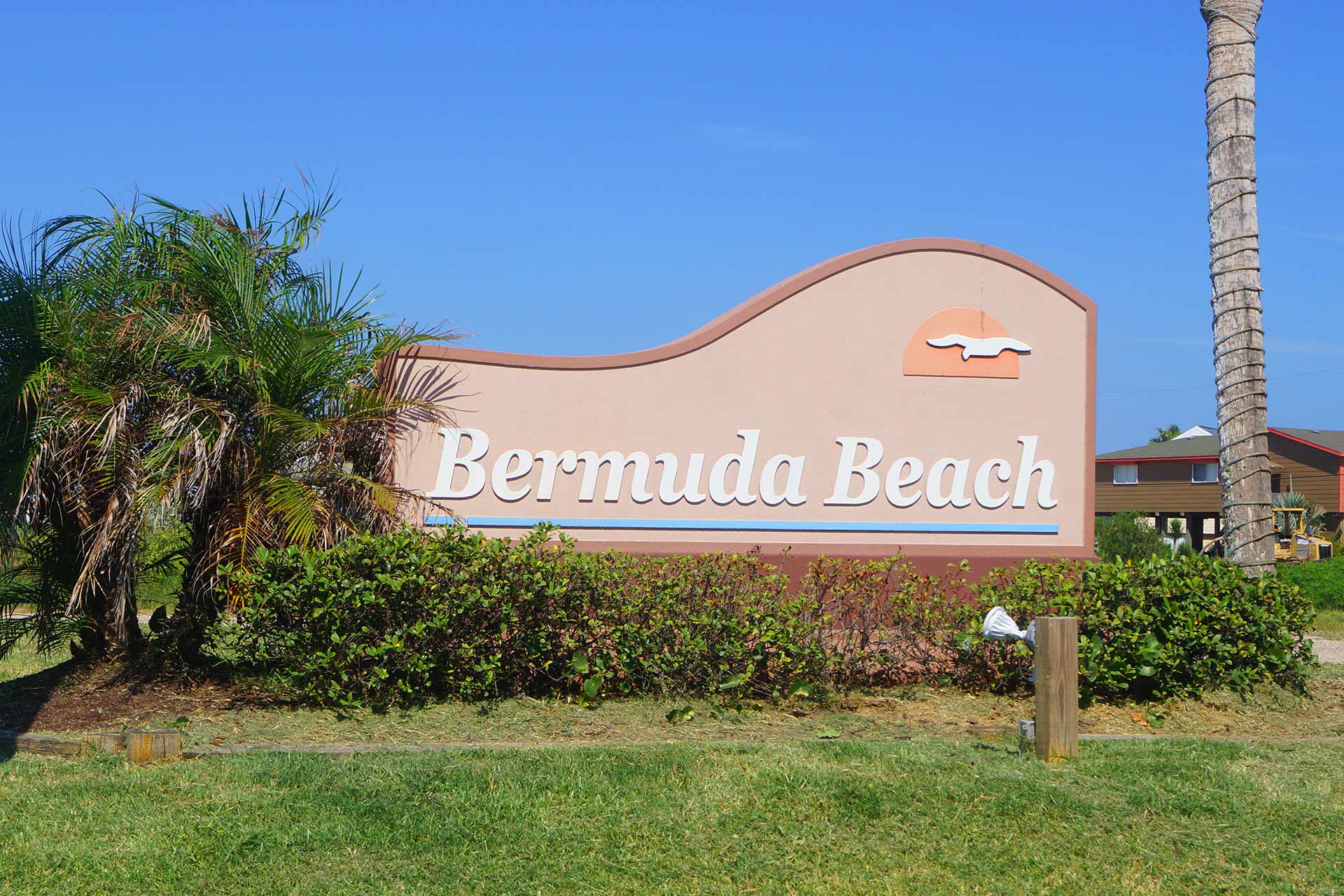 A sign in front of a building
