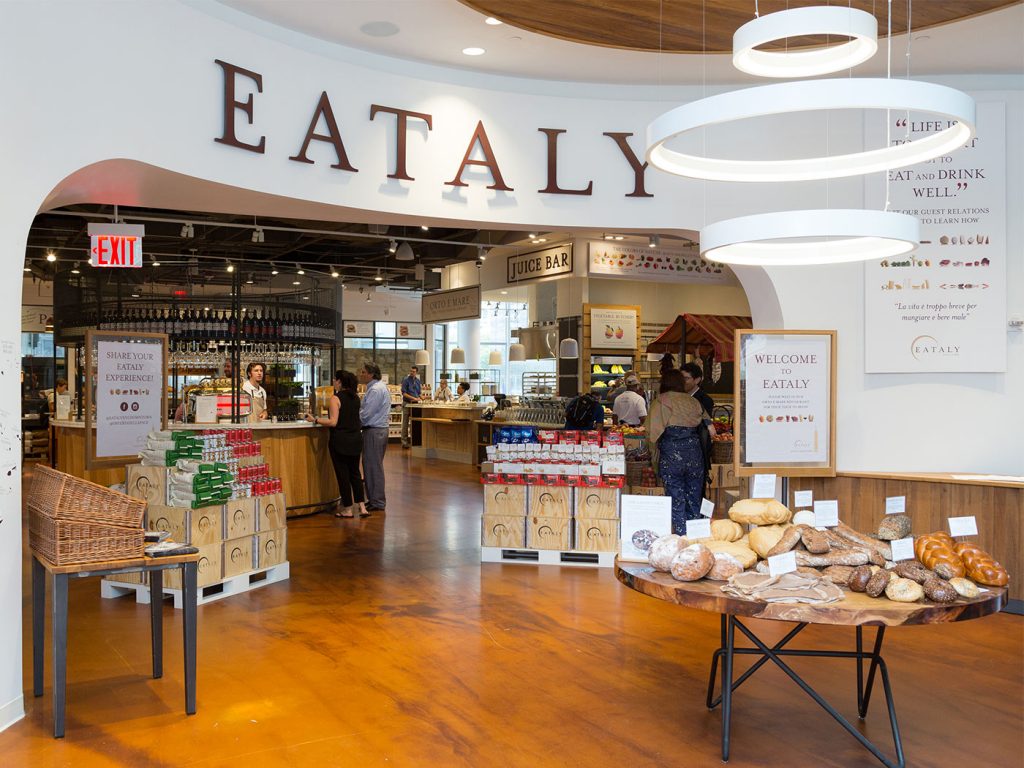 A dining room table in front of a store