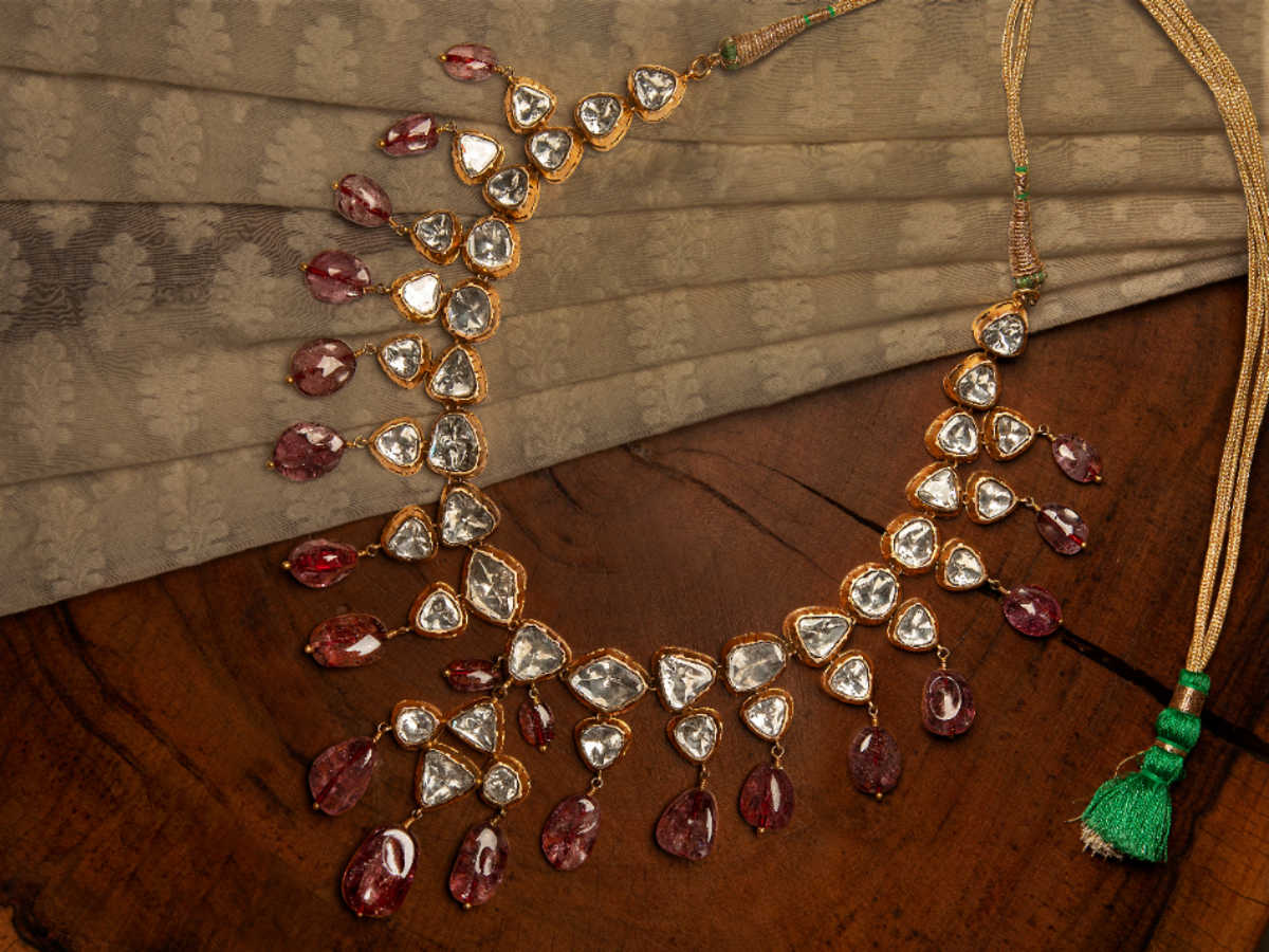 A necklace on a wooden table